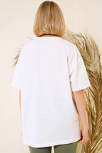 https://cdn.pazarium.com.tr/oversize-basic-t-shirt-ekru-497623-11-B.jpg