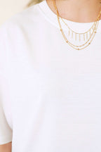 https://cdn.pazarium.com.tr/oversize-basic-t-shirt-ekru-497624-11-B.jpg