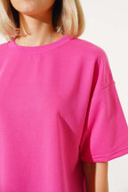 https://cdn.pazarium.com.tr/oversize-basic-t-shirt-fusya-549319-13-B.jpg