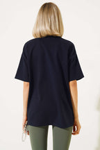 https://cdn.pazarium.com.tr/oversize-basic-t-shirt-lacivert-549316-13-B.jpg