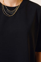 https://cdn.pazarium.com.tr/oversize-basic-t-shirt-siyah-497600-11-B.jpg