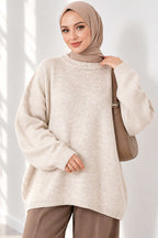 https://cdn.pazarium.com.tr/oversize-dusuk-omuz-triko-tunik-bej-844334-17-B.jpg