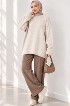 https://cdn.pazarium.com.tr/oversize-dusuk-omuz-triko-tunik-bej-844335-17-B.jpg