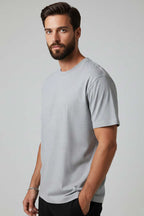 https://cdn.pazarium.com.tr/oversize-erkek-tshirt-gri-712399-17-B.jpg