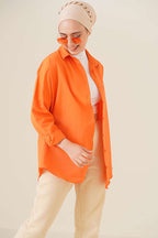 https://cdn.pazarium.com.tr/oversize-gomlek-oranj-787056-19-B.jpg