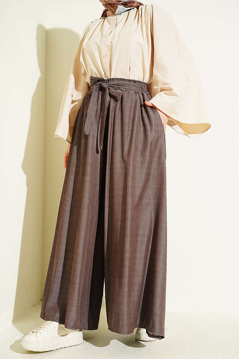 https://cdn.pazarium.com.tr/oversize-pacali-baglamali-pantolon-kahve-762650-18-B.jpg