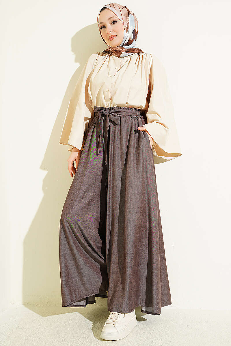 https://cdn.pazarium.com.tr/oversize-pacali-baglamali-pantolon-kahve-762651-18-B.jpg