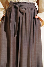https://cdn.pazarium.com.tr/oversize-pacali-baglamali-pantolon-kahve-762657-18-B.jpg
