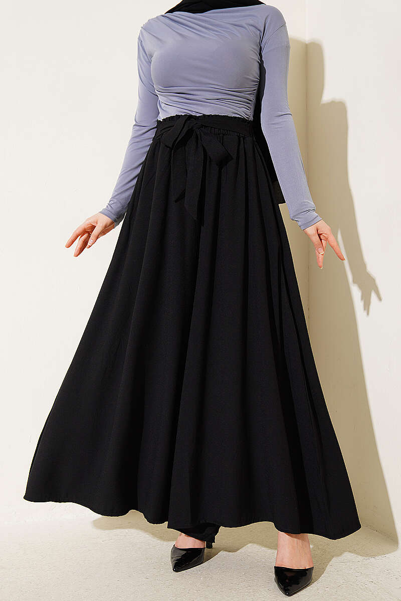 https://cdn.pazarium.com.tr/oversize-pacali-baglamali-pantolon-siyah-782679-19-B.jpg