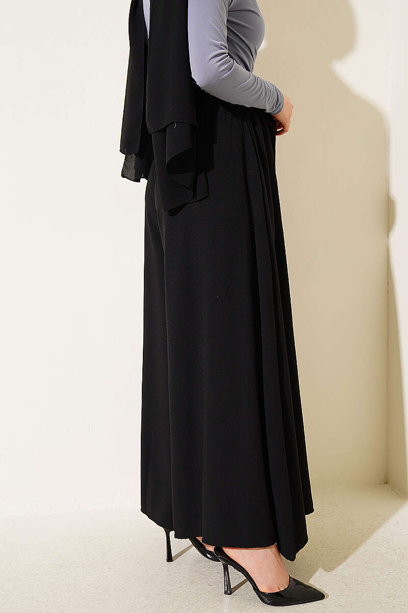 https://cdn.pazarium.com.tr/oversize-pacali-baglamali-pantolon-siyah-782681-19-B.jpg