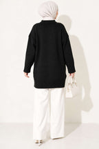 https://cdn.pazarium.com.tr/oversize-ribanali-triko-tunik-bej-204070-823094-20-B.jpg