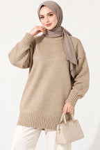 https://cdn.pazarium.com.tr/oversize-ribanali-triko-tunik-bej-822575-20-B.jpg