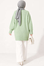 https://cdn.pazarium.com.tr/oversize-ribanali-triko-tunik-cagla-yesili-822582-20-B.jpg