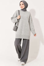https://cdn.pazarium.com.tr/oversize-ribanali-triko-tunik-gri-822589-20-B.jpg