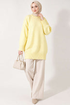 https://cdn.pazarium.com.tr/oversize-ribanali-triko-tunik-sari-822601-20-B.jpg