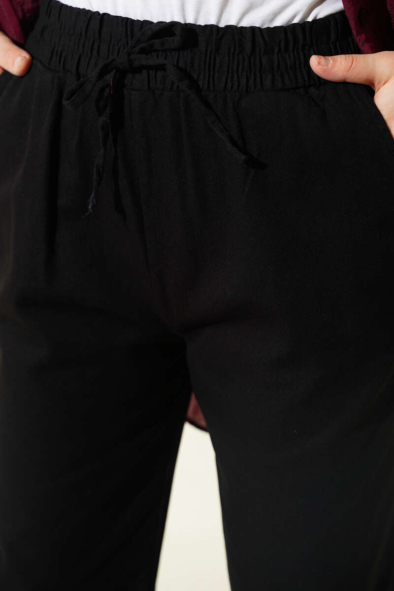 Paça Püsküllü Lastikli Gabardin Pantolon Siyah