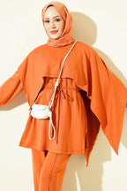 https://cdn.pazarium.com.tr/pelerin-detayli-modal-ikili-takim-oranj-820030-20-B.jpg