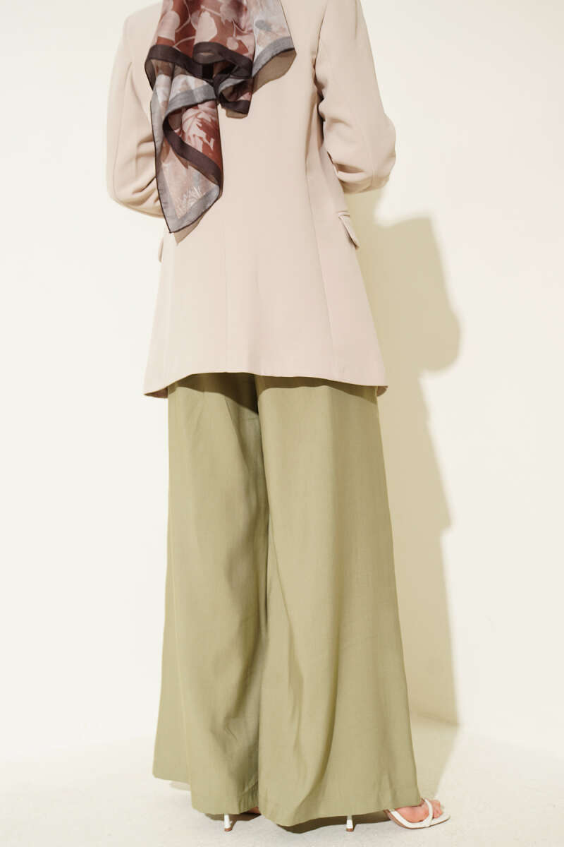 https://cdn.pazarium.com.tr/pileli-kemerli-oversize-pantolon-cagla-yesili-751565-18-B.jpg