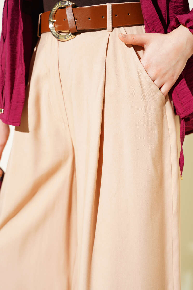 https://cdn.pazarium.com.tr/pileli-kemerli-oversize-pantolon-latte-759570-18-B.jpg
