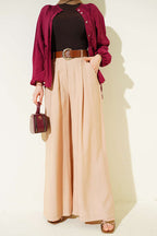 https://cdn.pazarium.com.tr/pileli-kemerli-oversize-pantolon-latte-759572-18-B.jpg