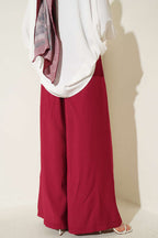 https://cdn.pazarium.com.tr/pileli-kemerli-oversize-pantolon-visne-751553-18-B.jpg
