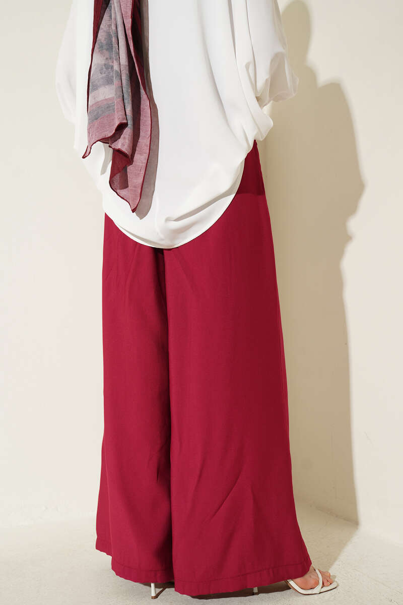 https://cdn.pazarium.com.tr/pileli-kemerli-oversize-pantolon-visne-751553-18-B.jpg