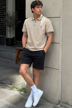 https://cdn.pazarium.com.tr/polo-yaka-dugmeli-ribanali-erkek-t-shirt-camel-780275-19-B.jpg