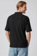 https://cdn.pazarium.com.tr/polo-yaka-fitilli-oversize-erkek-t-shirt-siyah-750362-18-B.jpg