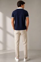https://cdn.pazarium.com.tr/polo-yaka-sahte-cepli-erkek-t-shirt-lacivert-786538-19-B.jpg