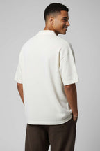 https://cdn.pazarium.com.tr/polo-yaka-yazili-erkek-triko-t-shirt-kemik-752321-18-B.jpg