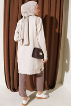 https://www.pazarium.com.tr/polyelit-yaka-detayli-triko-tunik-bej-831826-20-B.jpg