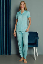 https://cdn.pazarium.com.tr/puantiye-desenli-kisa-kol-kadin-pijama-takimi-turkuaz-468617-11-B.jpg