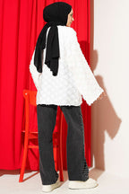 https://cdn.pazarium.com.tr/puskullu-firfirli-ip-baglamali-kimono-ekru-789021-19-B.jpg