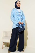 https://cdn.pazarium.com.tr/puskullu-firfirli-ip-baglamali-kimono-mavi-789013-19-B.jpg