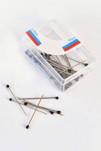 https://cdn.pazarium.com.tr/renkli-basli-siyah-toplu-igne-310813-70-B.jpg