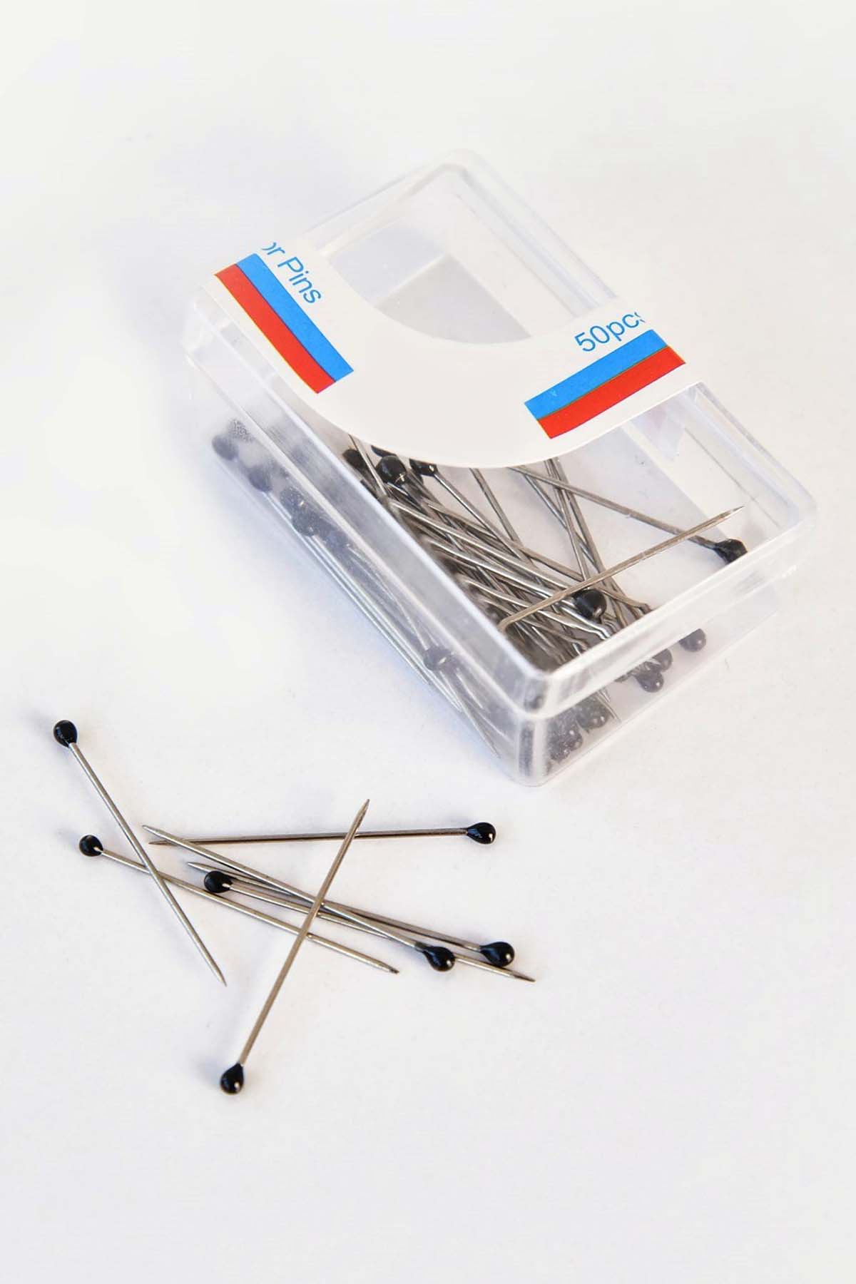 https://cdn.pazarium.com.tr/renkli-basli-siyah-toplu-igne-310813-70-B.jpg