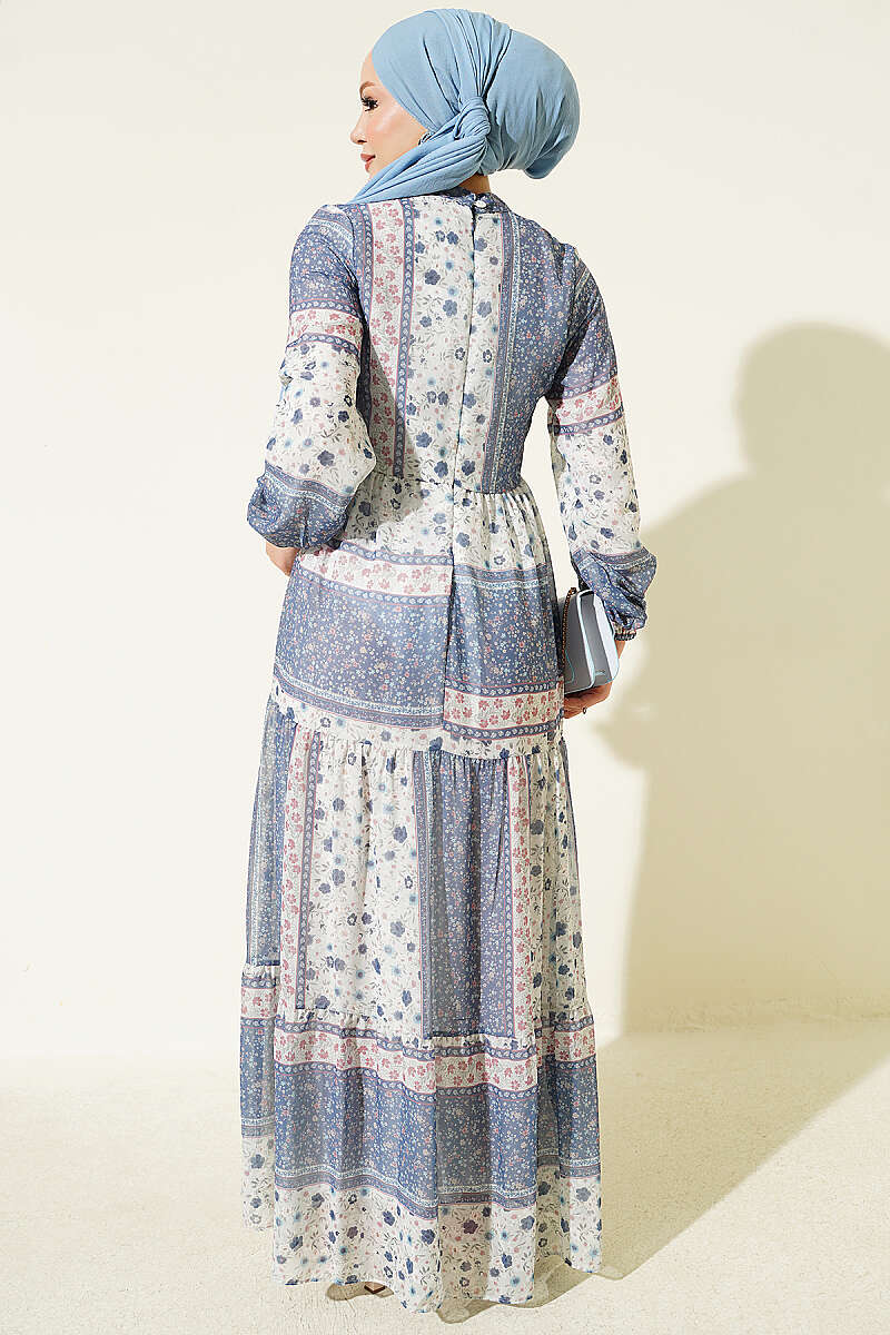 https://cdn.pazarium.com.tr/retro-cicek-desenli-sifon-elbise-lacivert-816243-20-B.jpg