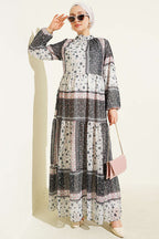 https://cdn.pazarium.com.tr/retro-cicek-desenli-sifon-elbise-siyah-815146-20-B.jpg