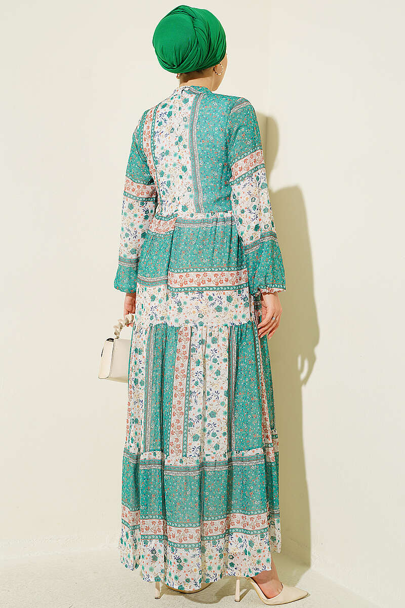 https://cdn.pazarium.com.tr/retro-cicek-desenli-sifon-elbise-yesil-815105-20-B.jpg