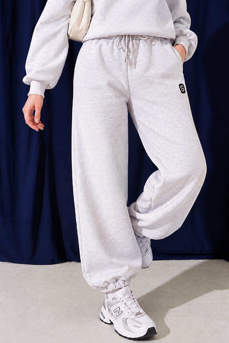 https://cdn.pazarium.com.tr/s-armali-sardonlu-jogger-pantolon-melanj-gri-839538-20-B.jpg