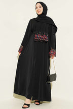 https://cdn.pazarium.com.tr/salli-cicek-suslemeli-abaya-elbise-siyah-799144-19-B.jpg