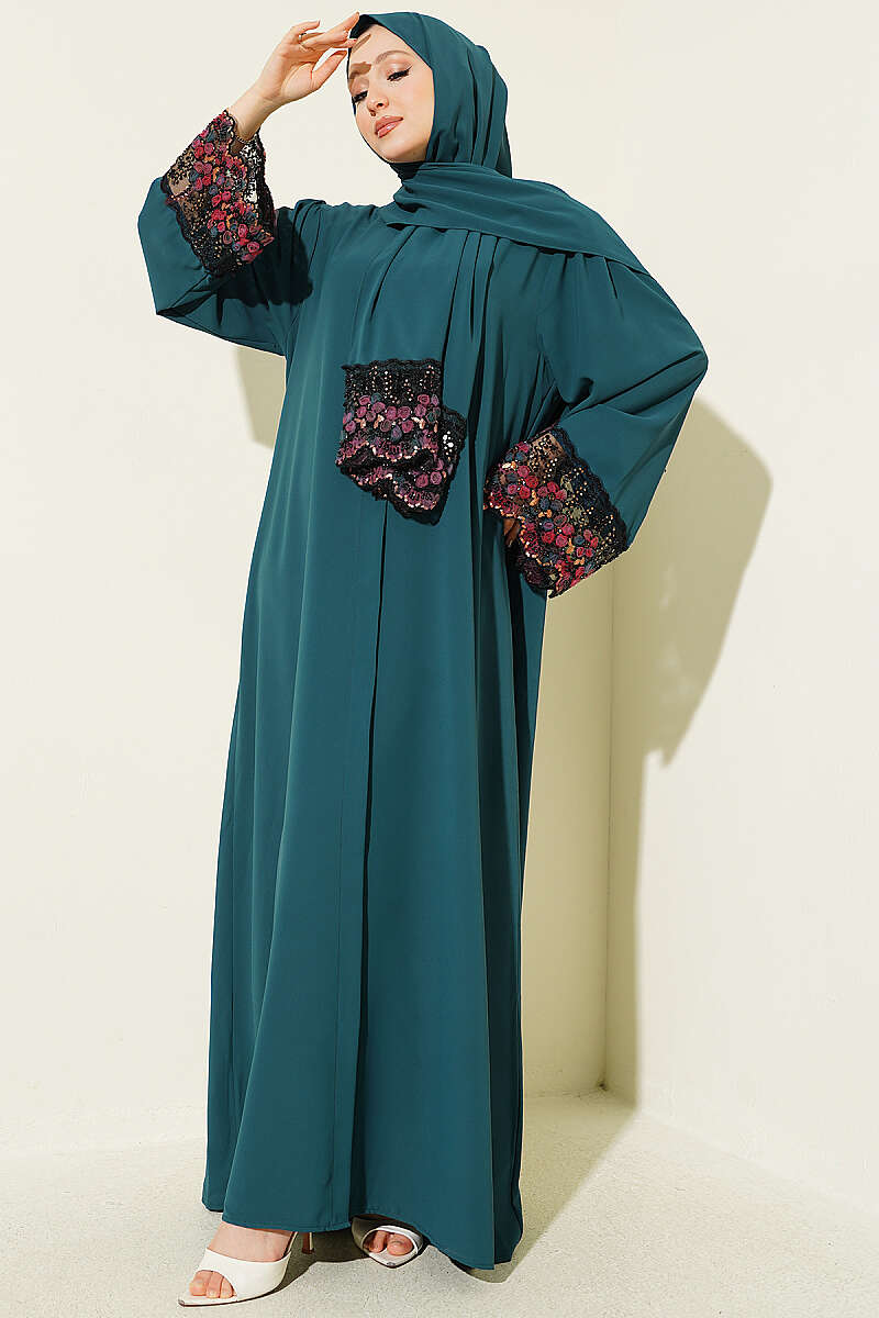 https://cdn.pazarium.com.tr/salli-cicek-suslemeli-abaya-elbise-zumrut-799148-19-B.jpg