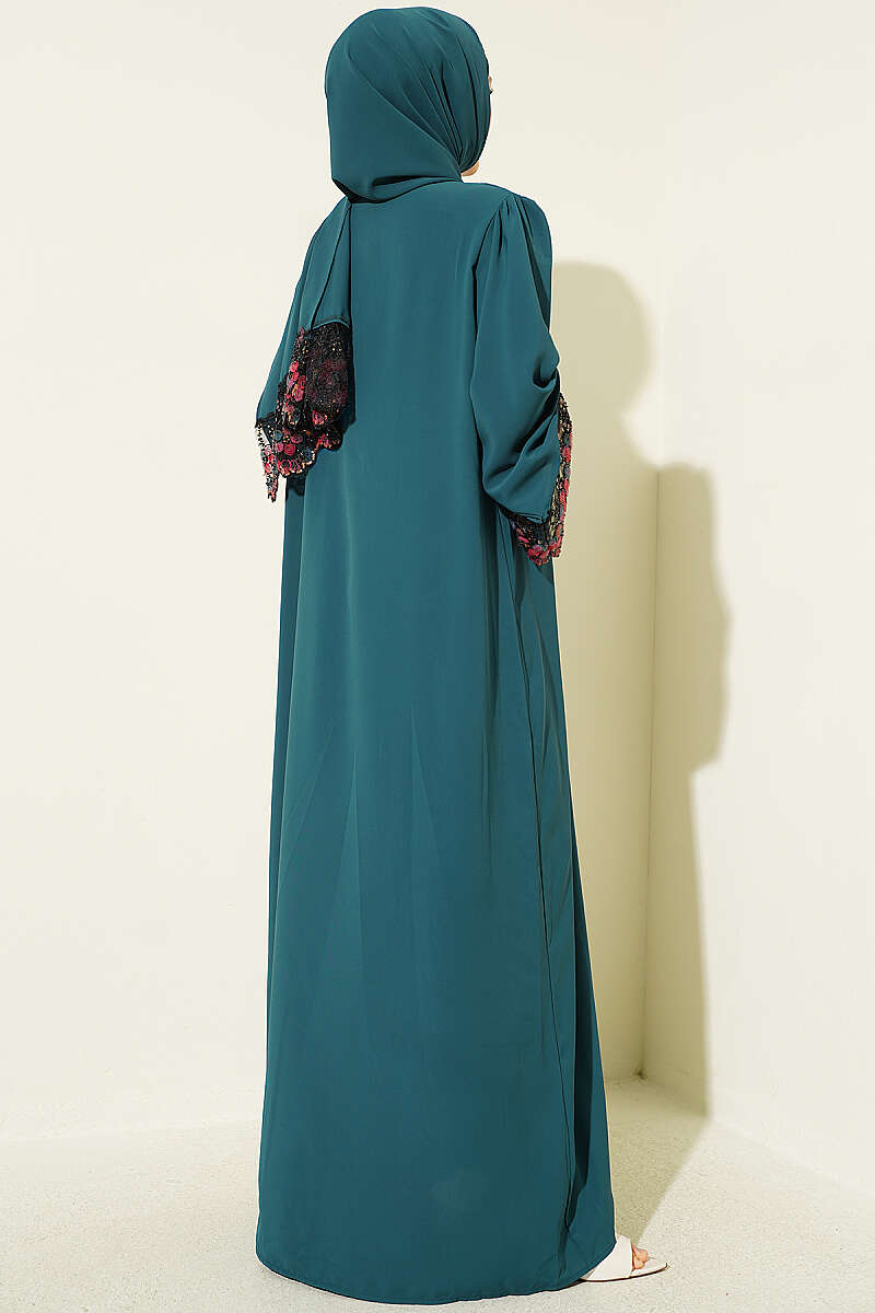 https://cdn.pazarium.com.tr/salli-cicek-suslemeli-abaya-elbise-zumrut-799153-19-B.jpg