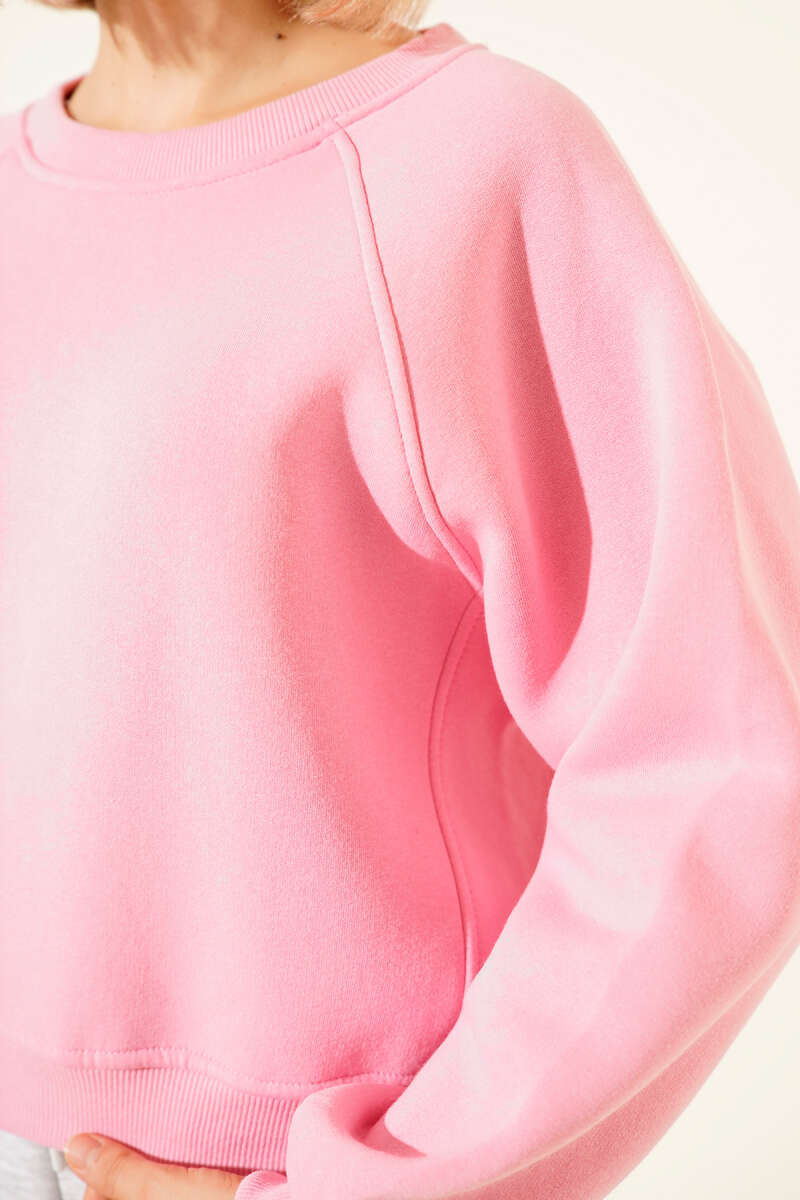 https://cdn.pazarium.com.tr/sardonlu-basic-kisa-sweatshirt-pembe-673051-16-B.jpg