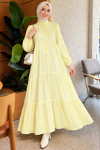 Vestido Beige con Abertura Frontal y Mangas Abullonadas