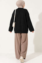https://cdn.pazarium.com.tr/selanik-orgu-oversize-triko-tunik-siyah-823893-20-B.jpg