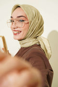 https://cdn.pazarium.com.tr/serit-cizgili-desenli-esarp-cagla-yesili-801560-19-B.jpg