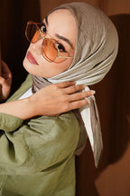 https://cdn.pazarium.com.tr/seritli-bambu-kras-esarp-kina-yesili-799752-19-B.jpg