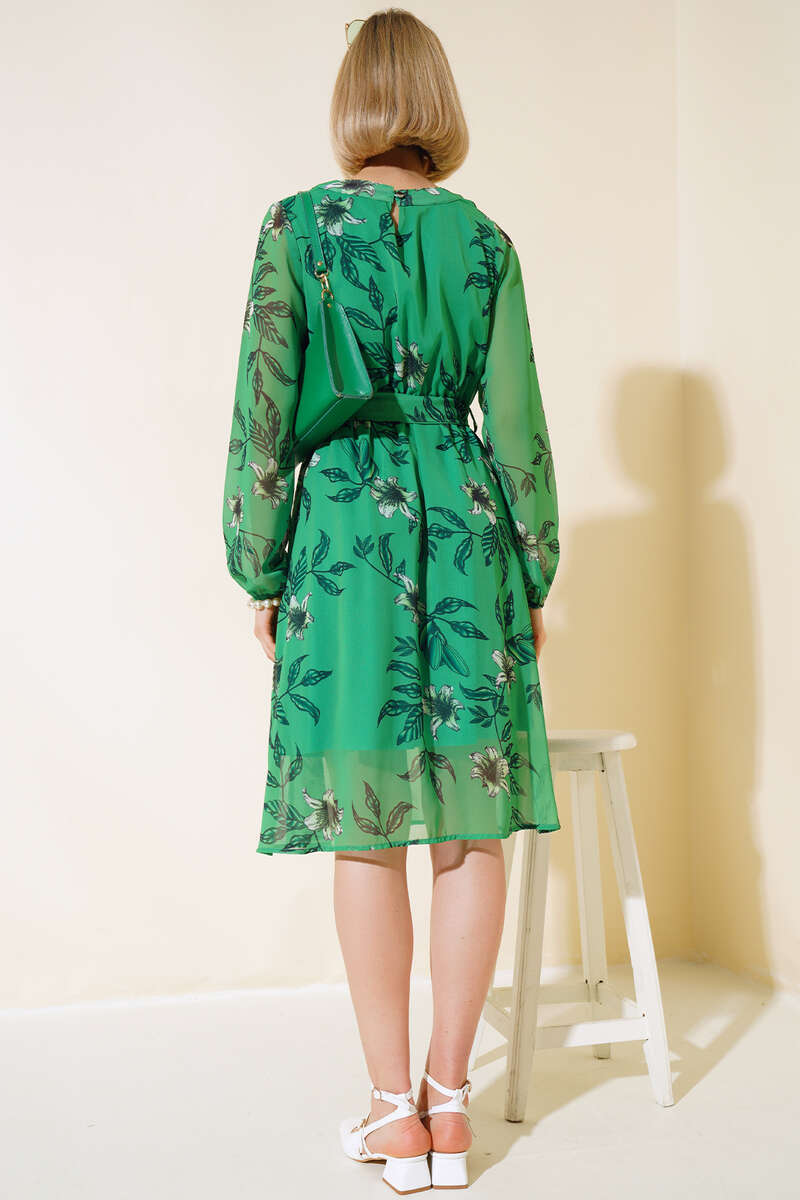 https://cdn.pazarium.com.tr/sifon-cicek-desenli-elbise-yesil-481065-11-B.jpg