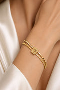 https://cdn.pazarium.com.tr/sira-tas-detayli-bileklik-gold-811692-20-B.jpg